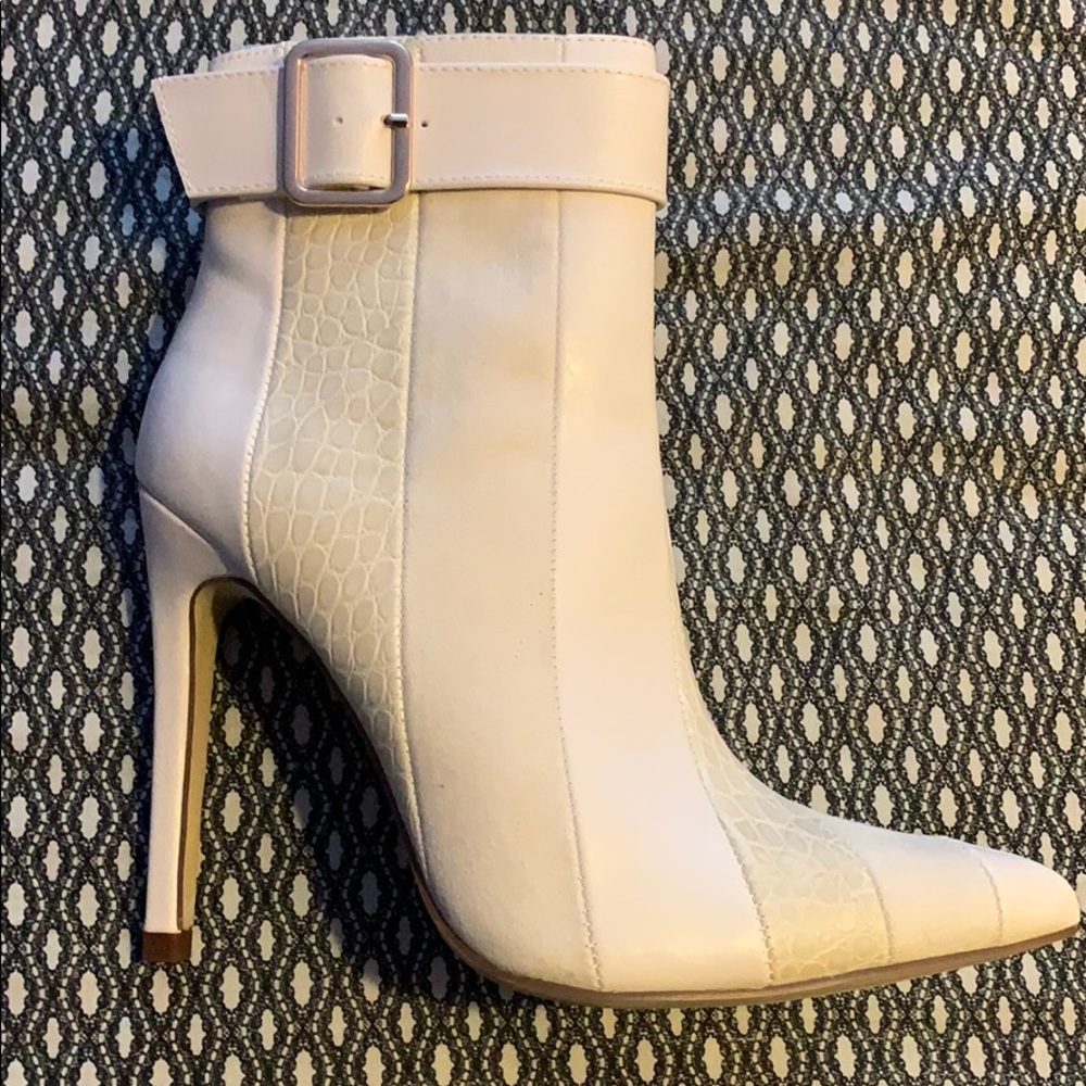 Brand new in box / never worn bone colored booties